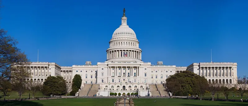 Wide view of the U.S. Capitol in Washington, D.C., with its central dome and House and Senate wings